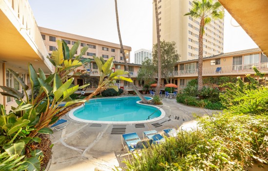 Welcome To Cal Mar Hotel Suites - Lush Courtyard and Pool